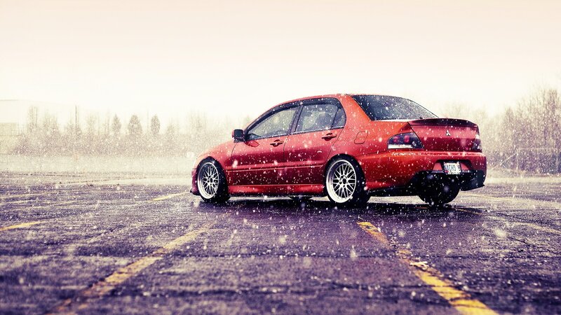 red car in snow