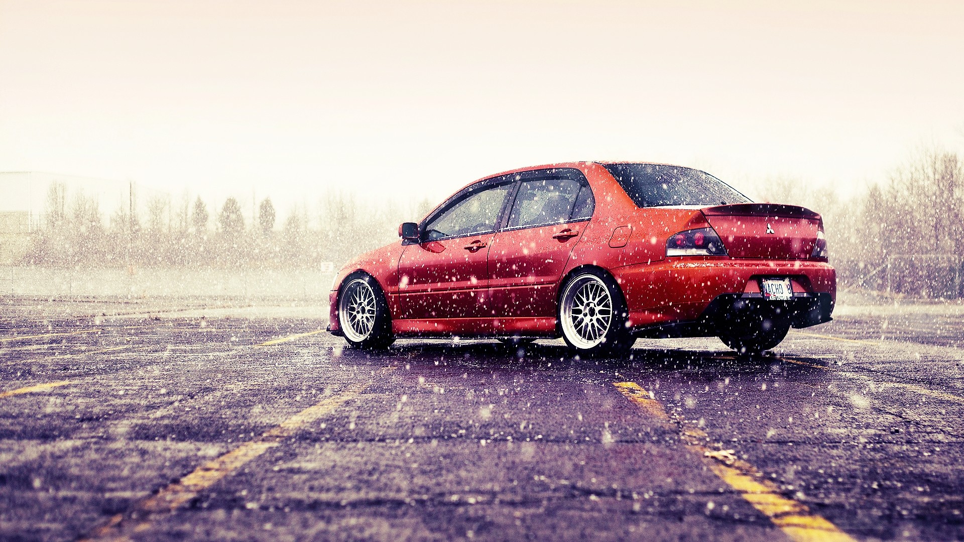 red car in snow