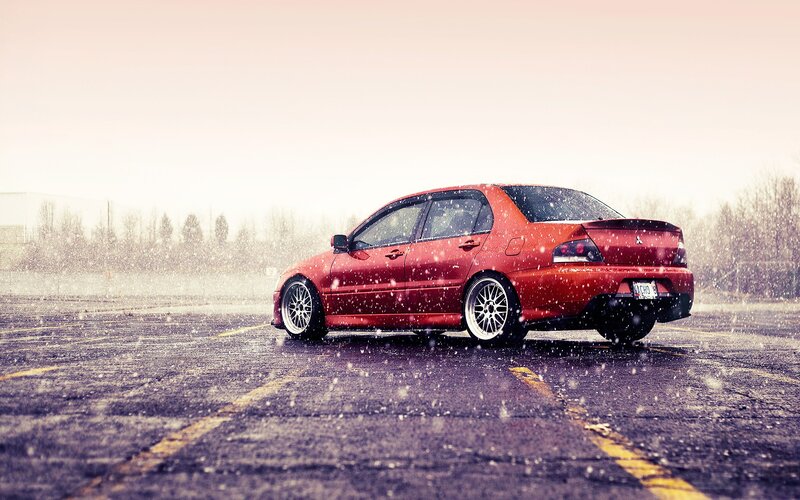 Red car in snowstorm