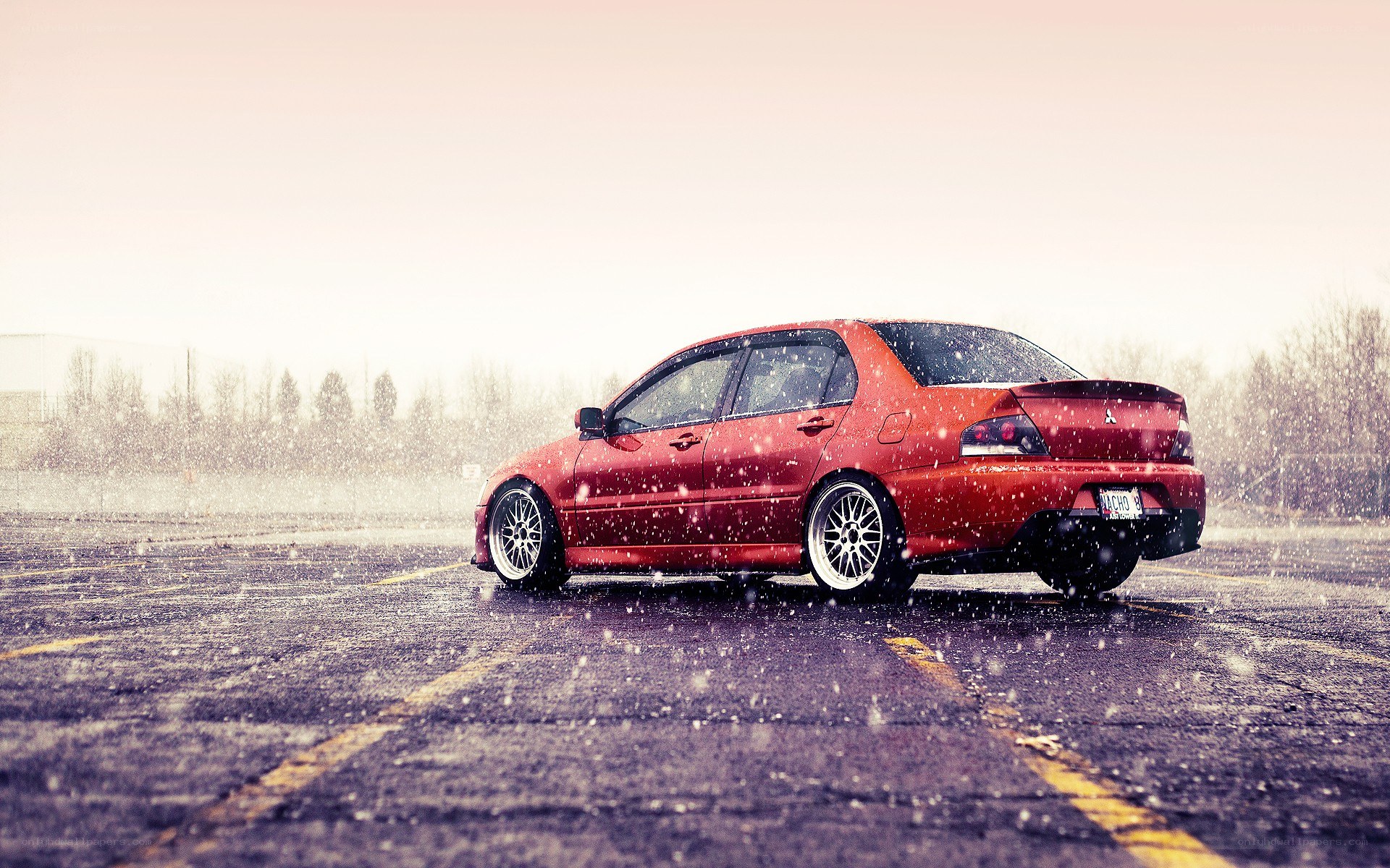 Red car in snowstorm