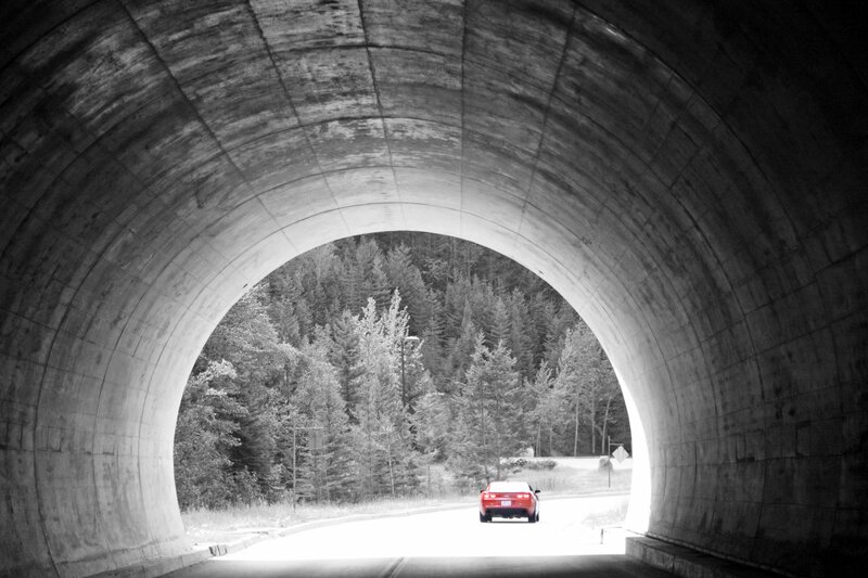 Red Car in Tunnel — Black
