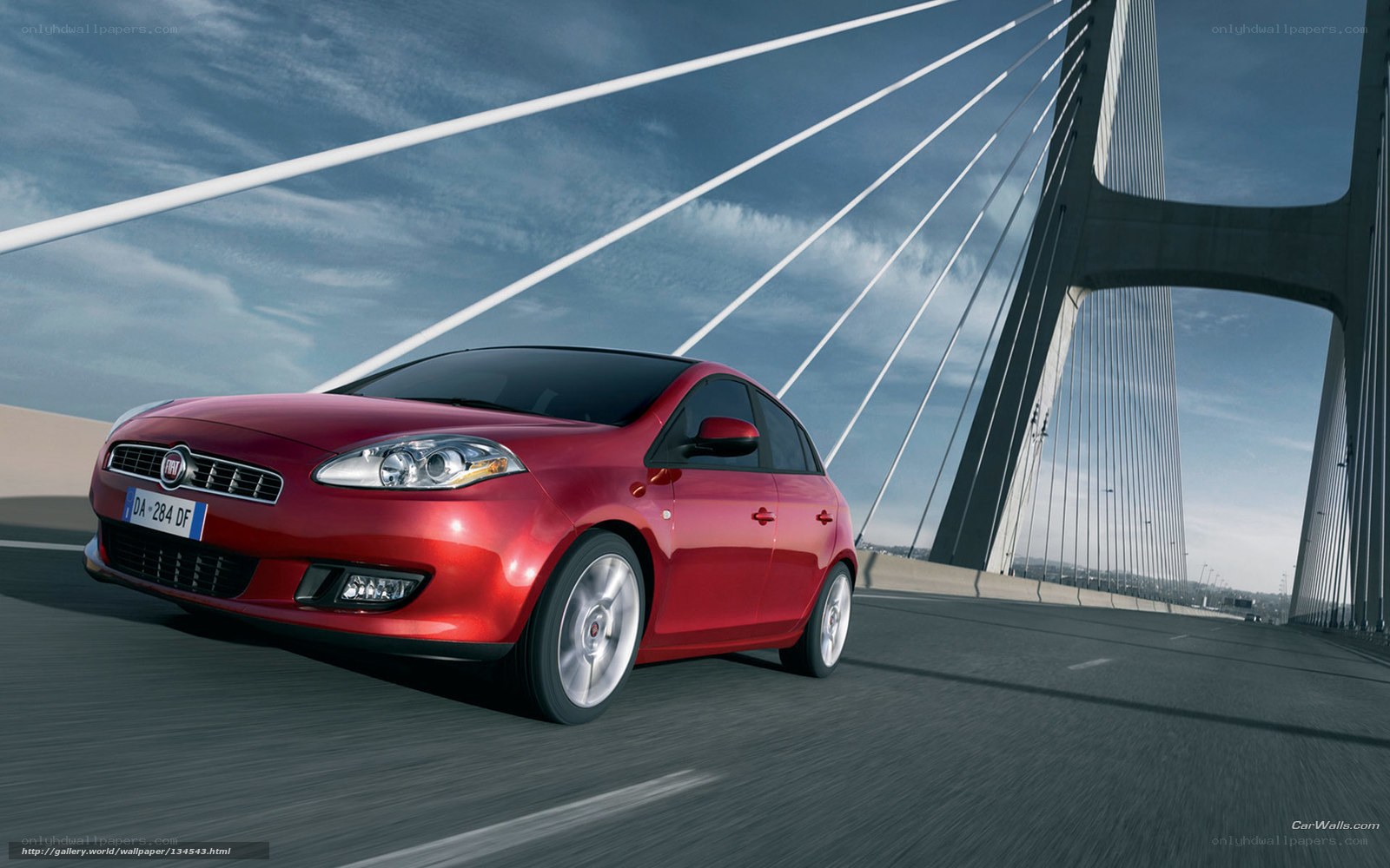 Red car on a bridge