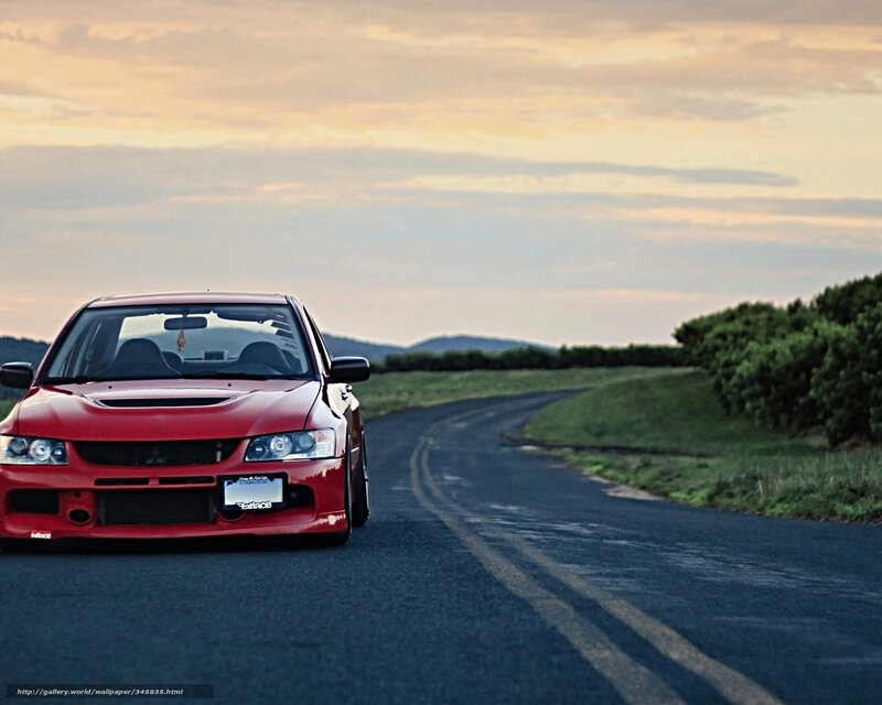 Red car on a country road