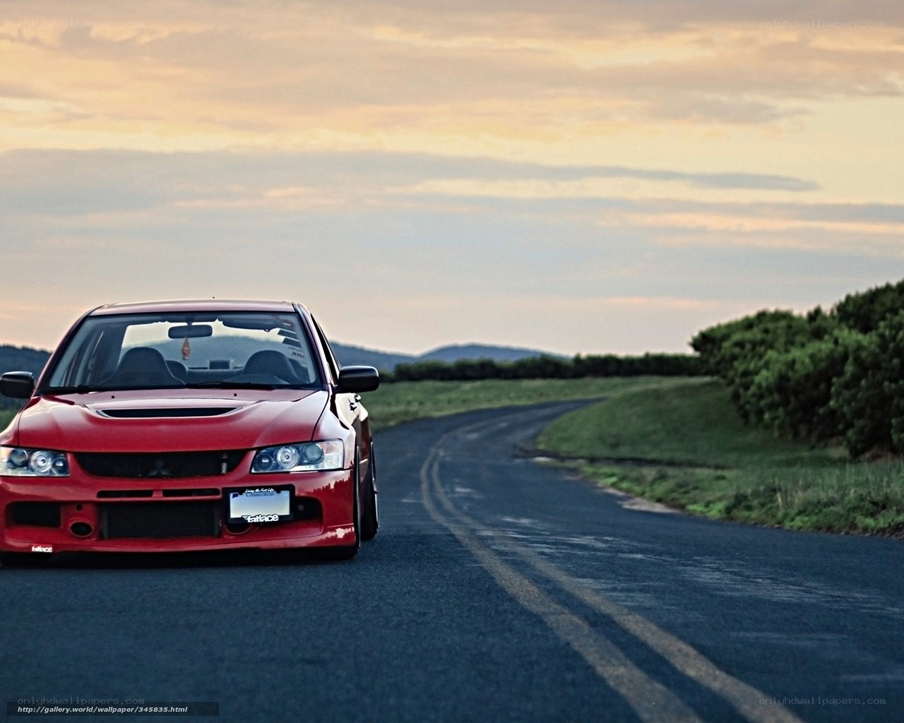 Red car on a country road