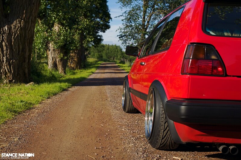 Red car on a country road