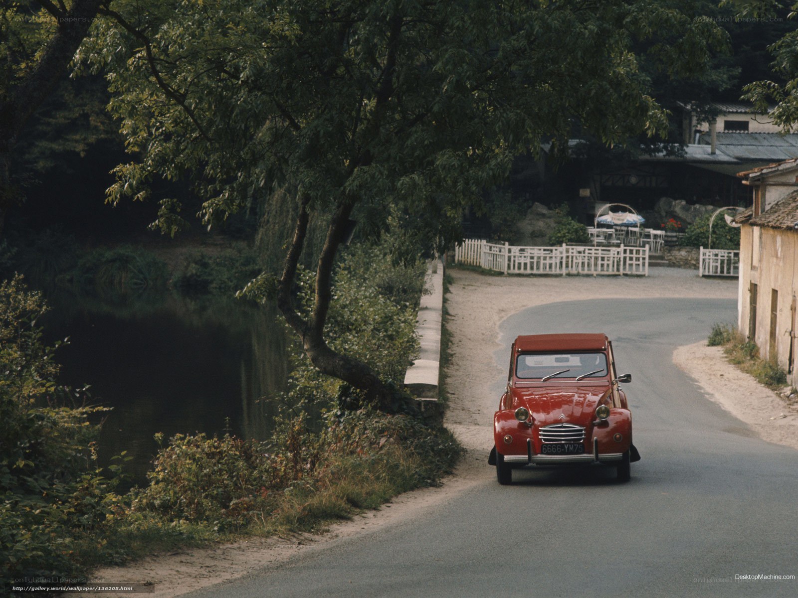 Red car on a country road