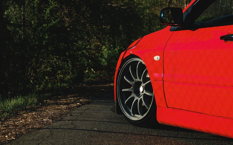 red car on a road