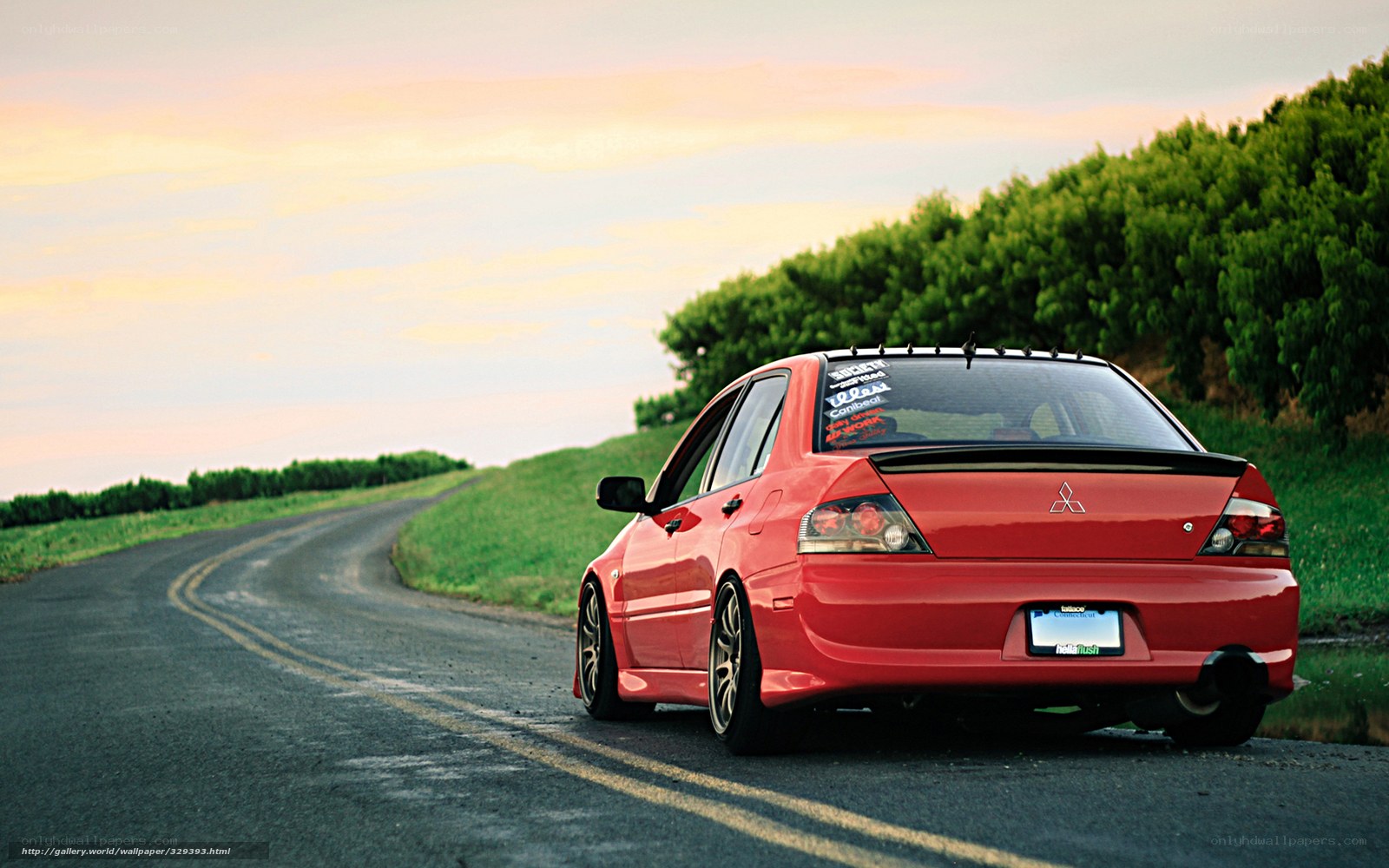 Red car on a winding road