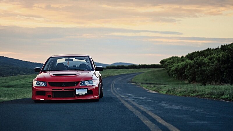 Red car on a winding road