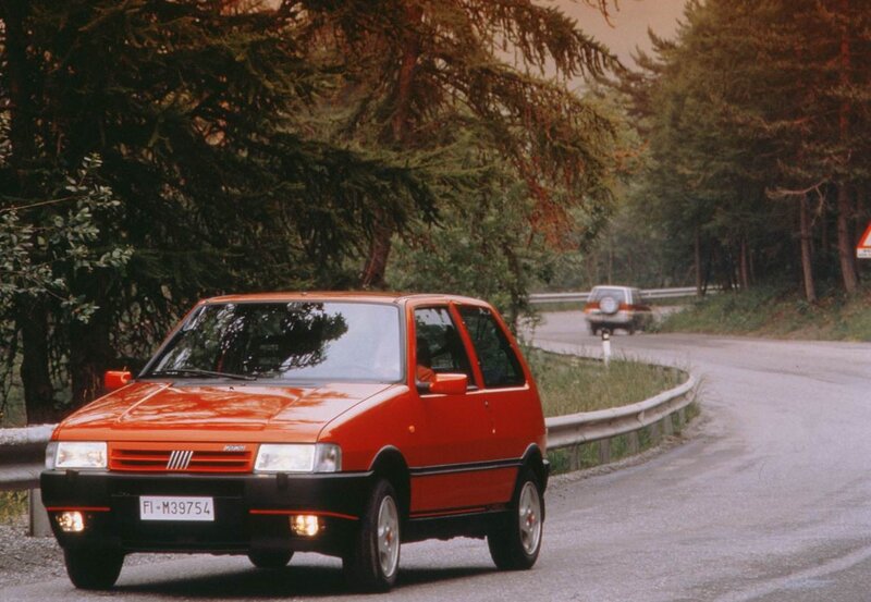 Red car on a winding road