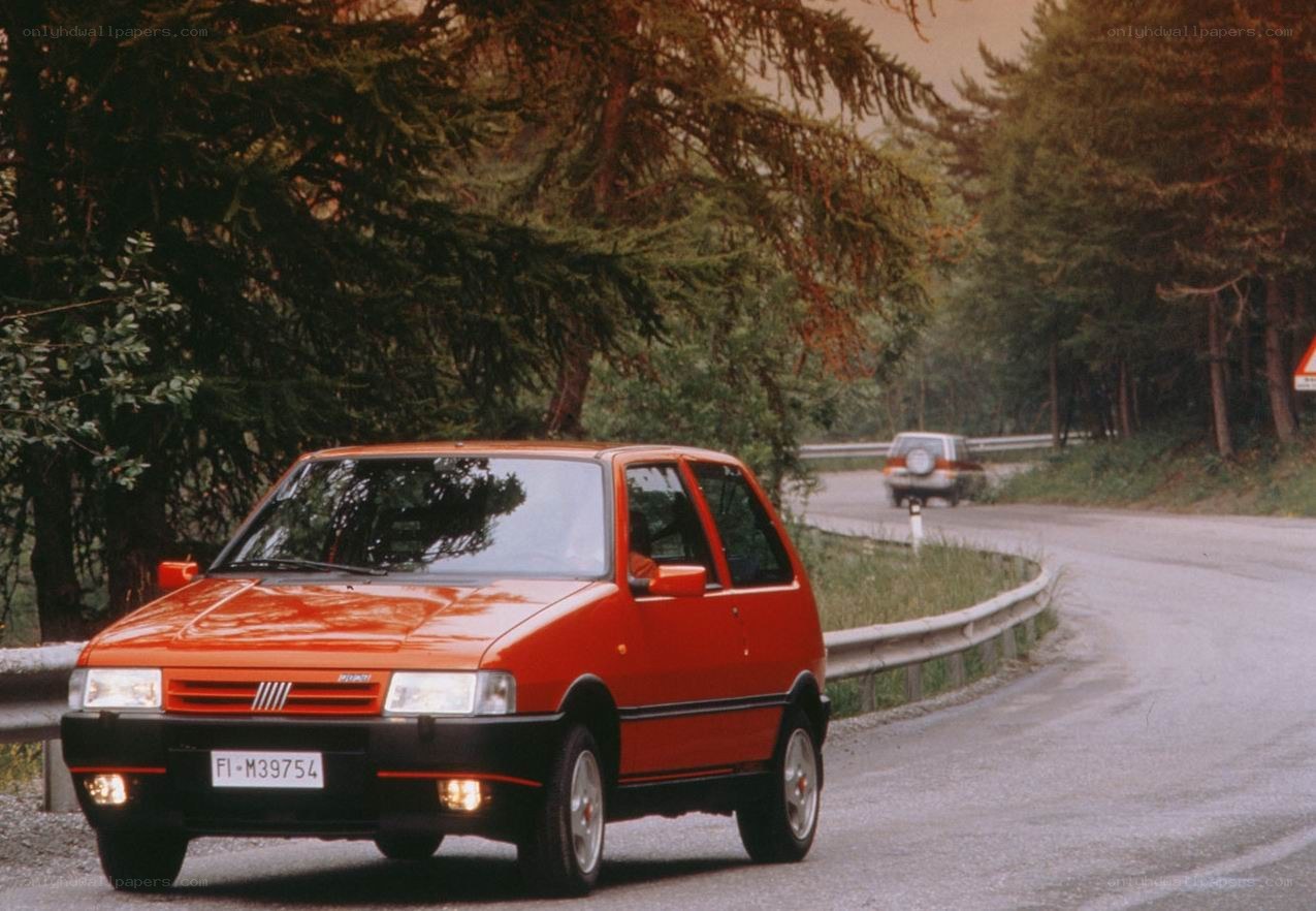 Red car on a winding road