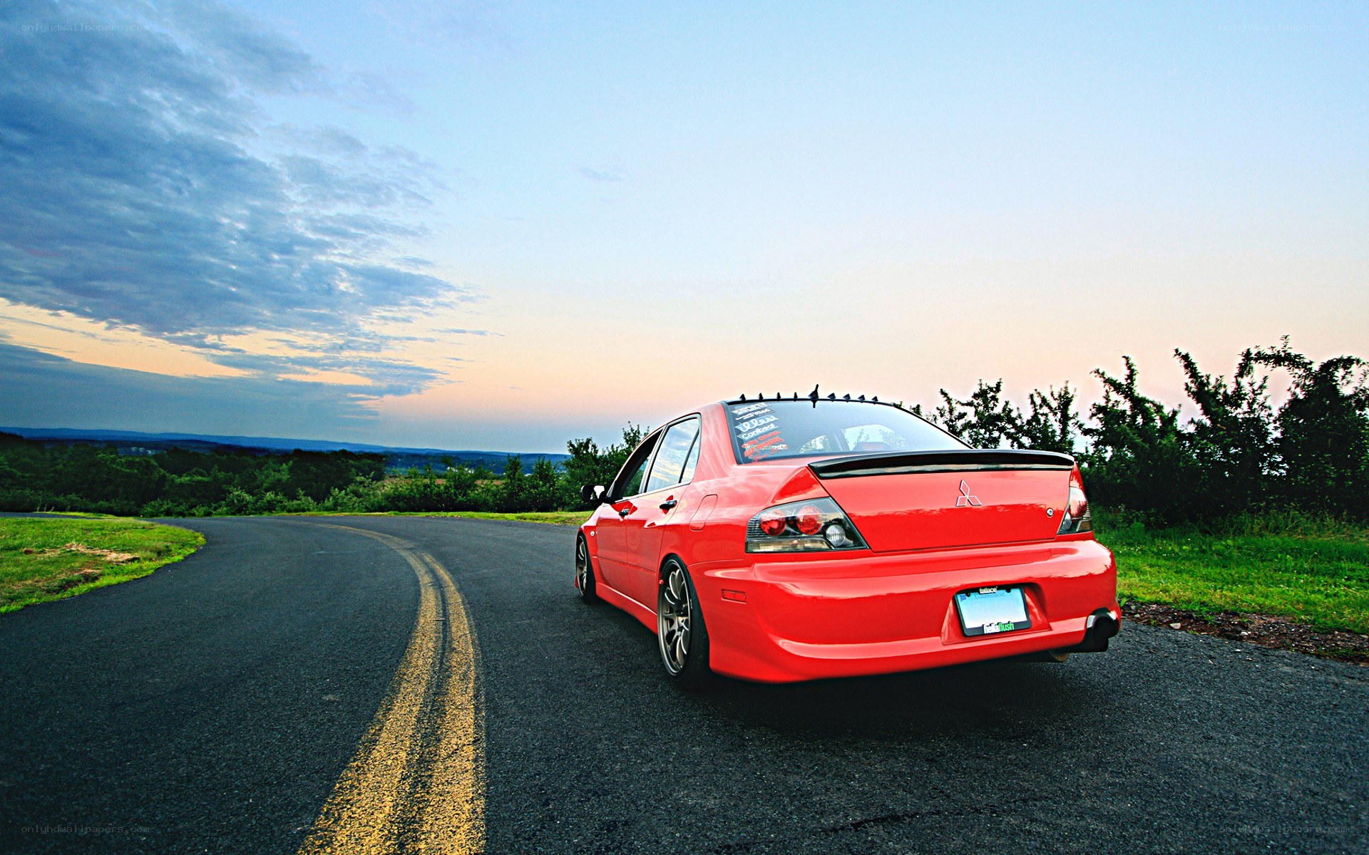 Red car on a winding road