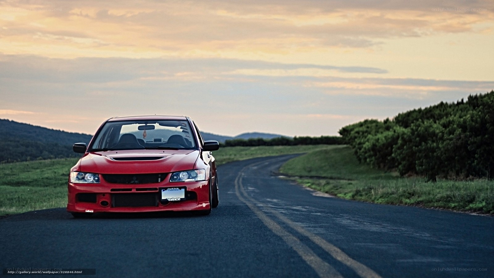 Red car on a winding road