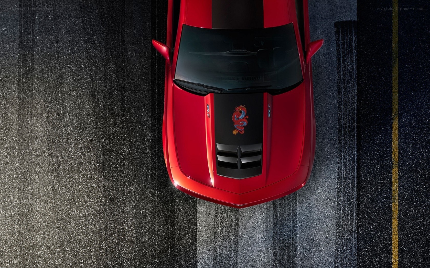 Red car on asphalt road