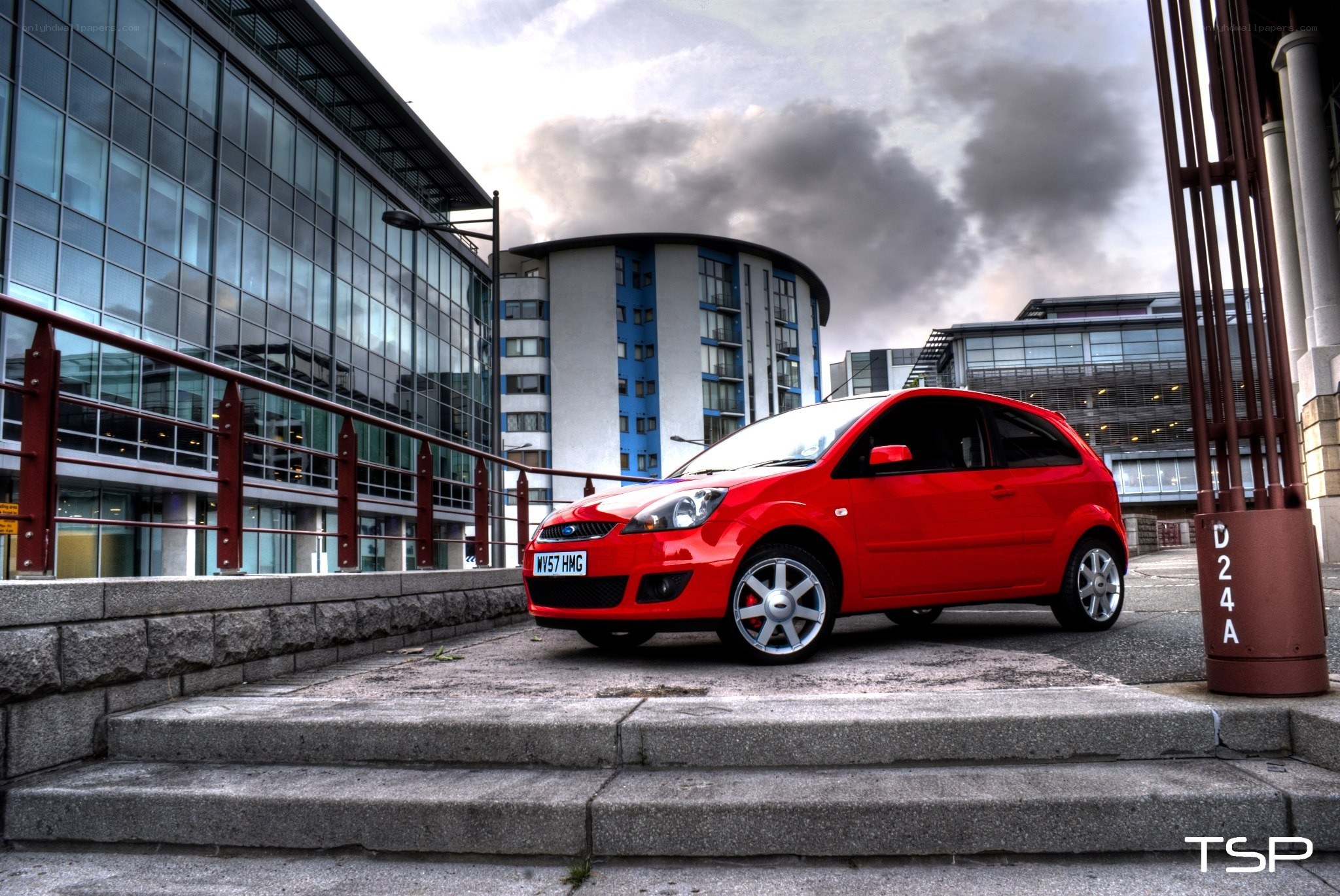 Red car on city steps