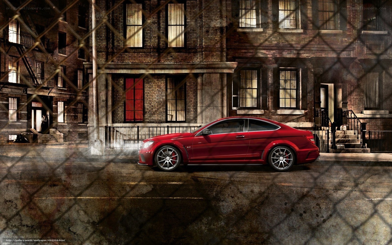 Red car on city street