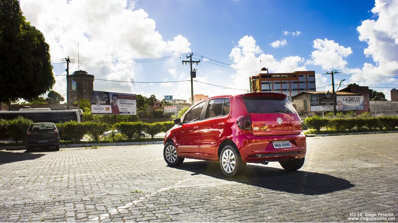 Red Car on Cobblestones