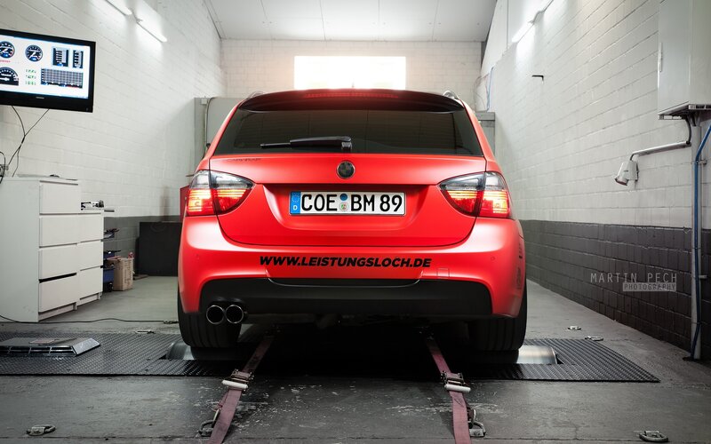 Red Car on Dynamometer — Neutral