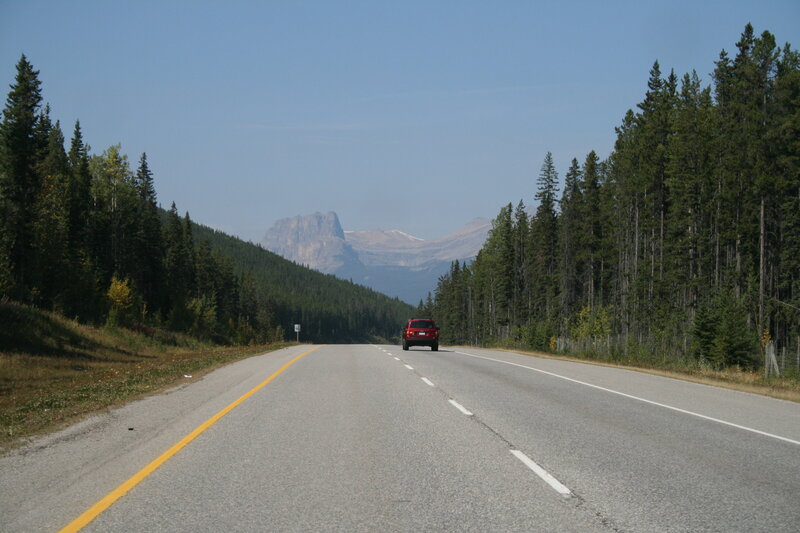Red Car on Highway — Gray, Serene