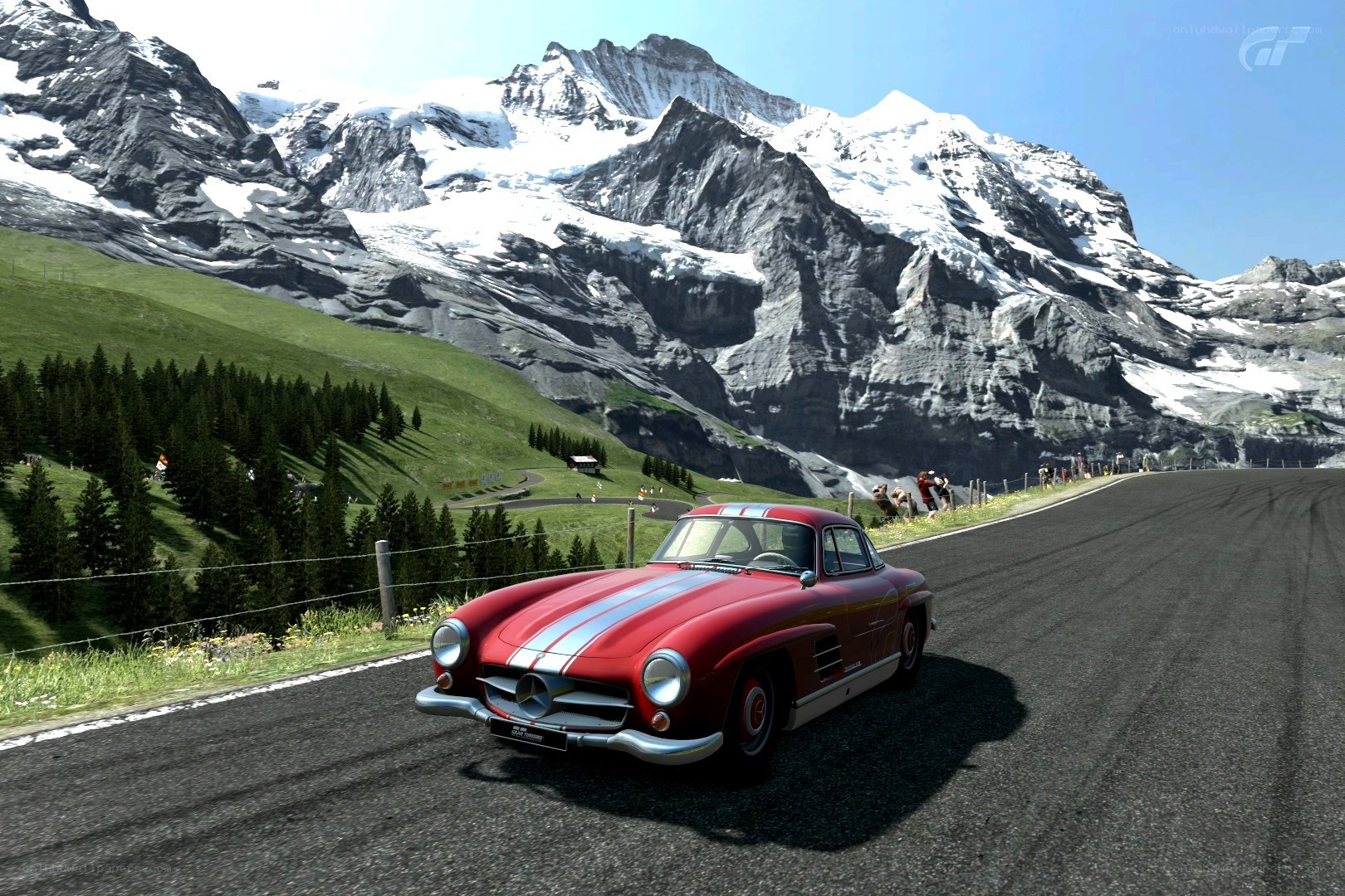 Red car on mountain road