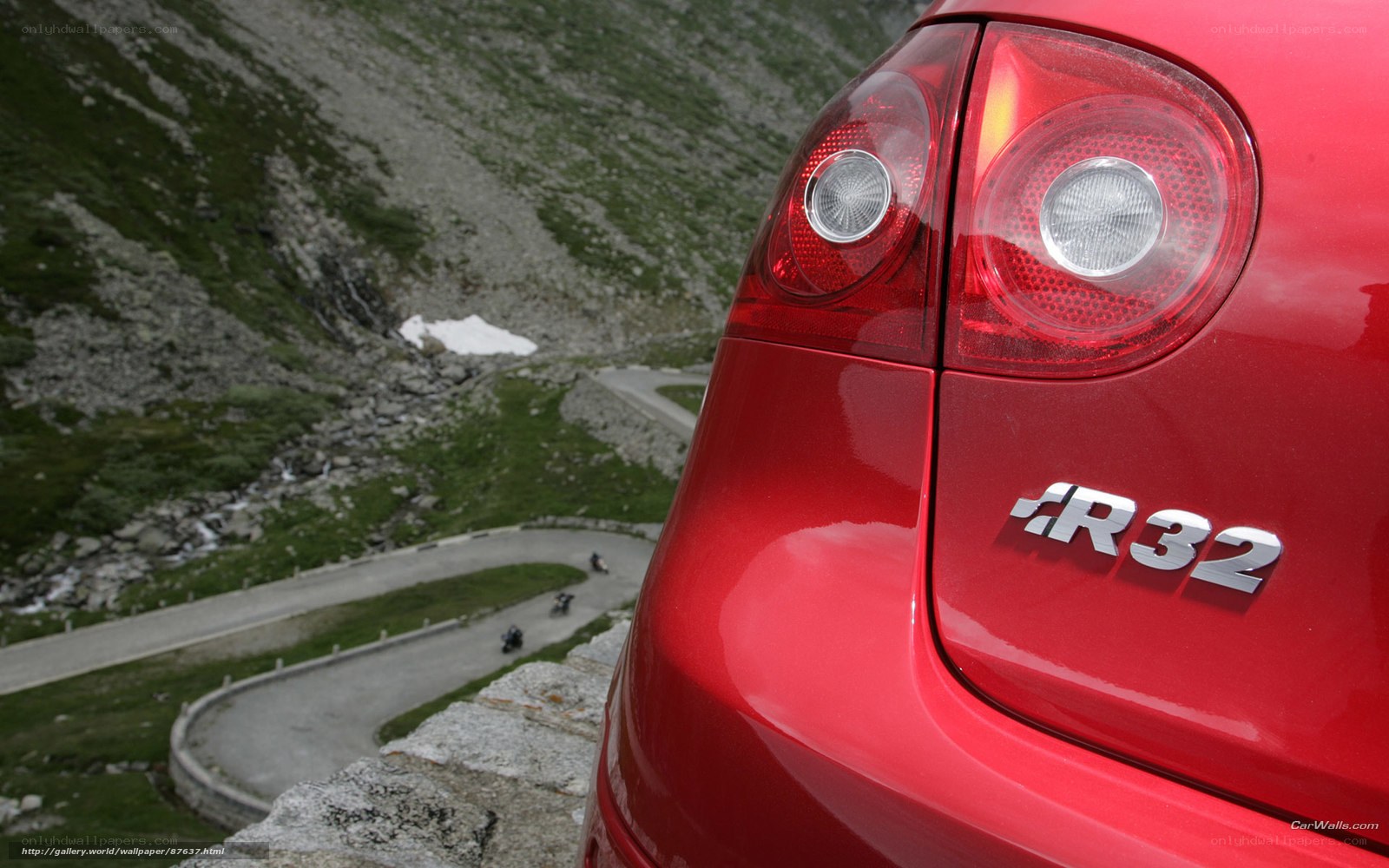 Red car on mountain road