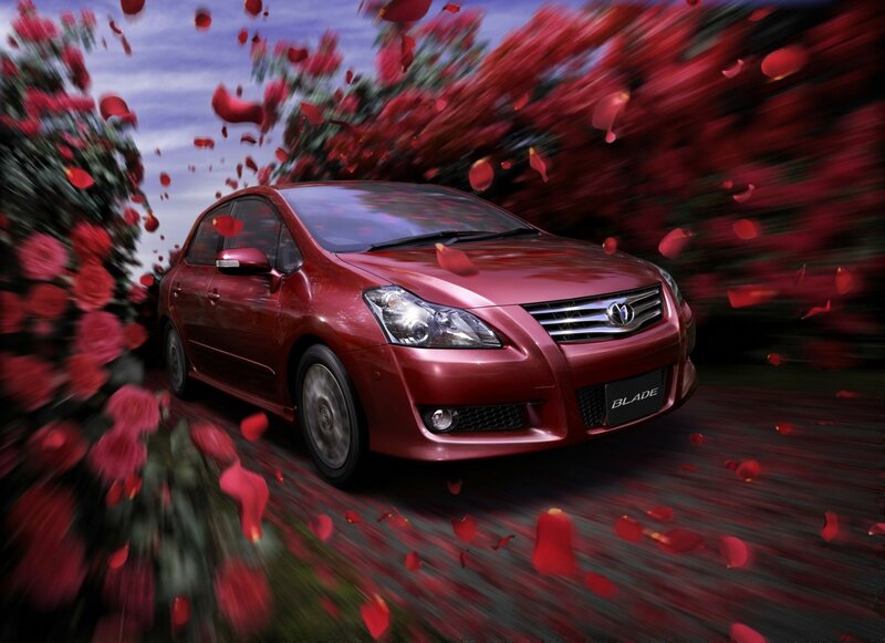 Red Car on Road — Dynamic, Afternoon, Photograph, Flowers