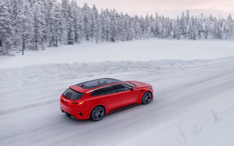Red Car on Snowy Road — Serene