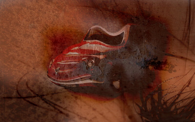 Red car on textured background