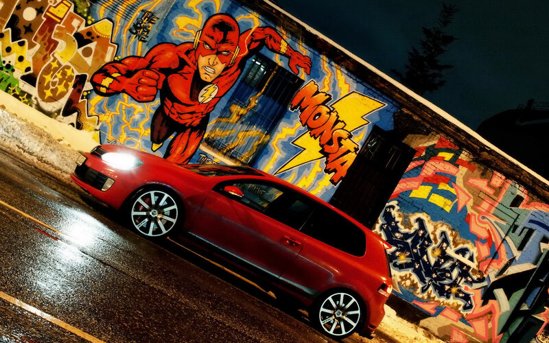 Red Car on Wet Street