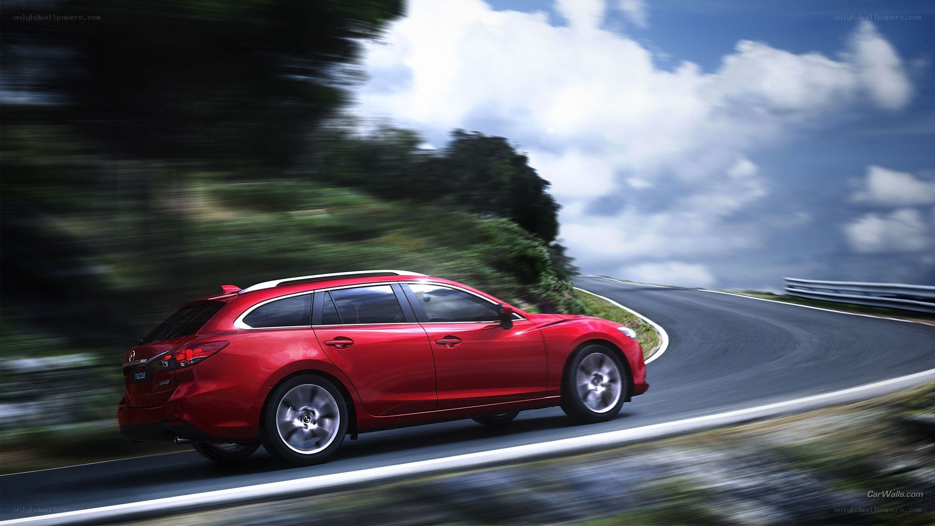 Red car on winding road