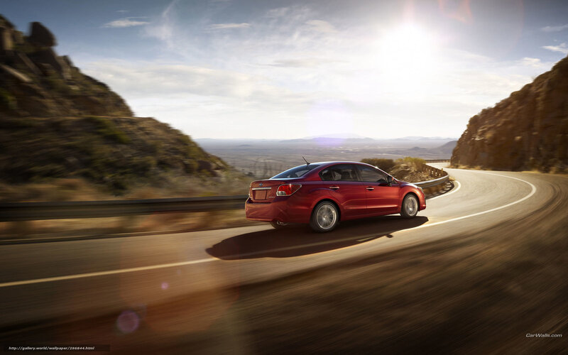Red car on winding road