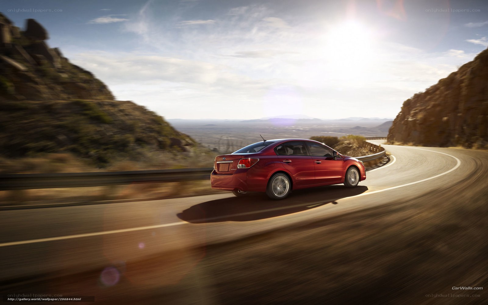 Red car on winding road