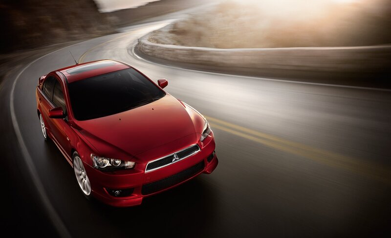 Red car on winding road