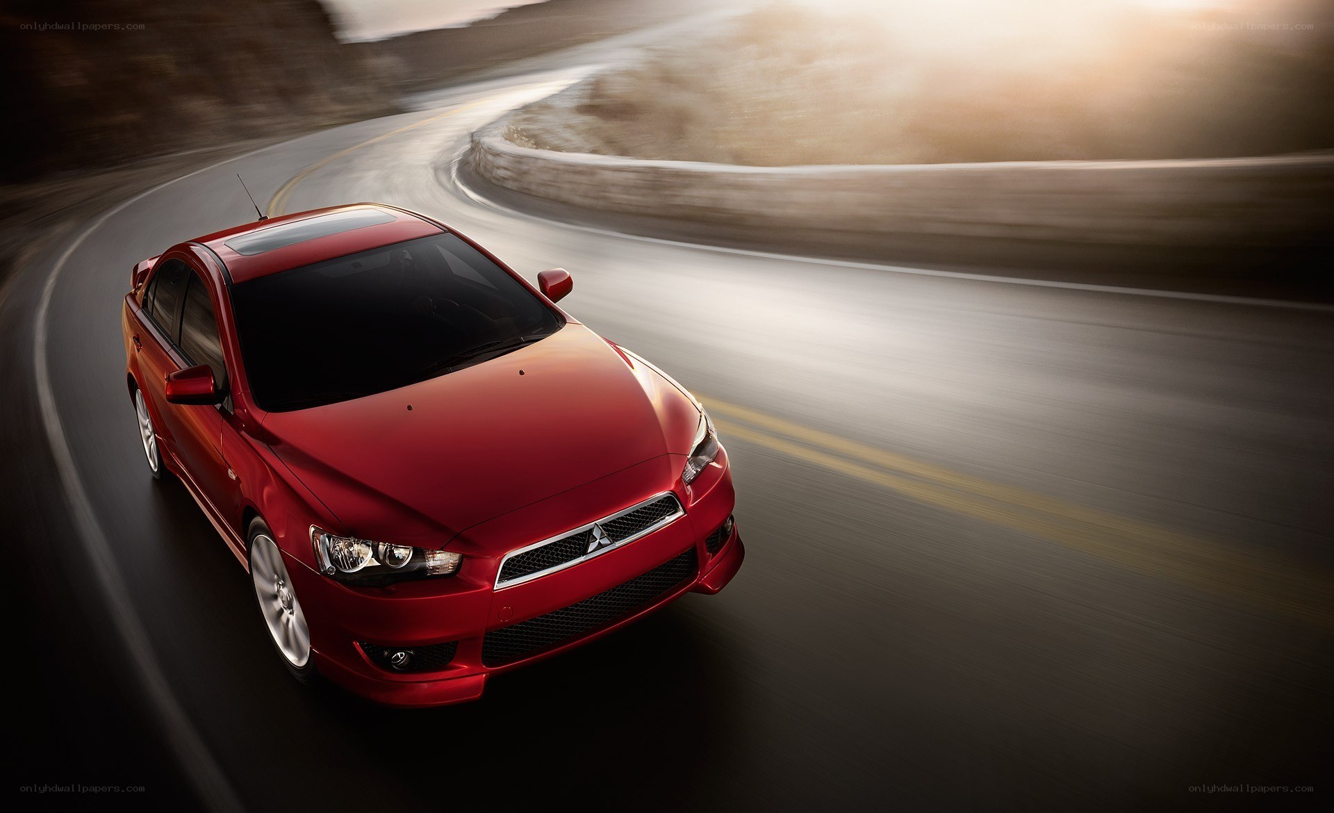 Red car on winding road