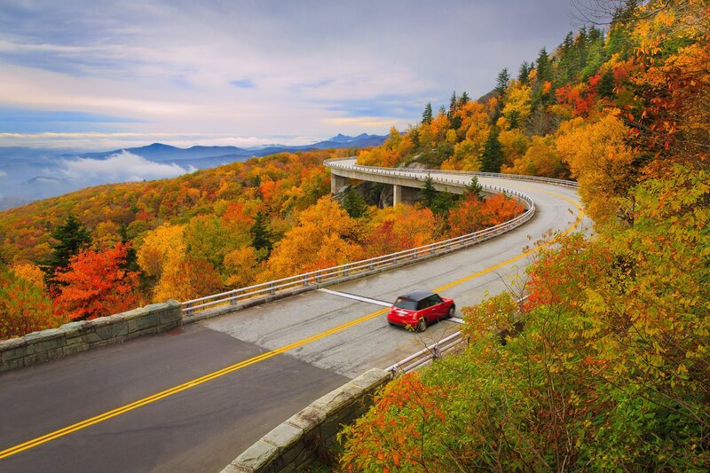 Red Car on Winding Road — Orange