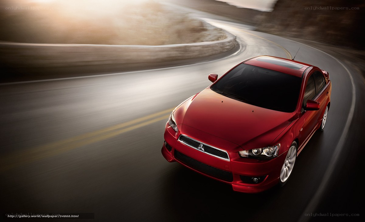 Red car on winding road
