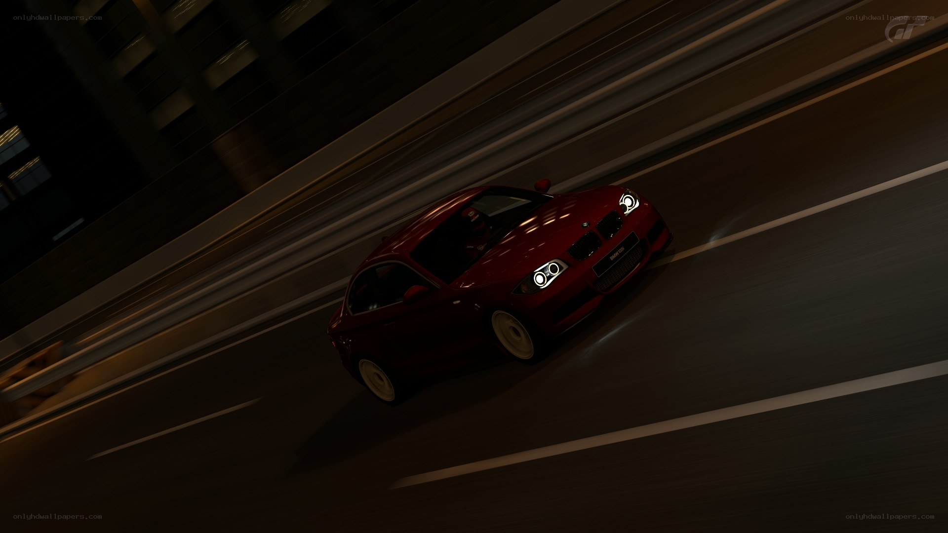 Red car racing at night