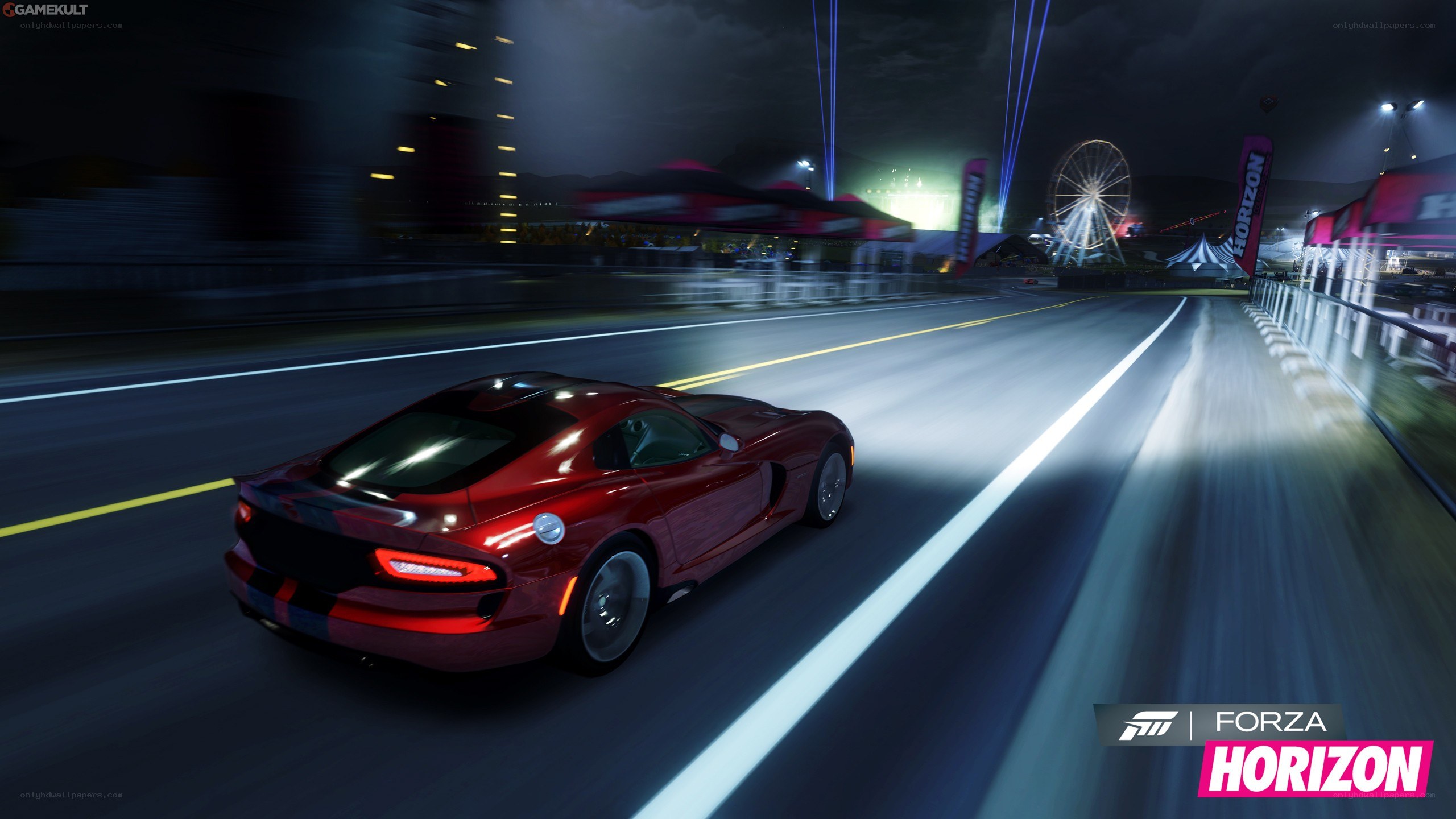 Red car racing at night