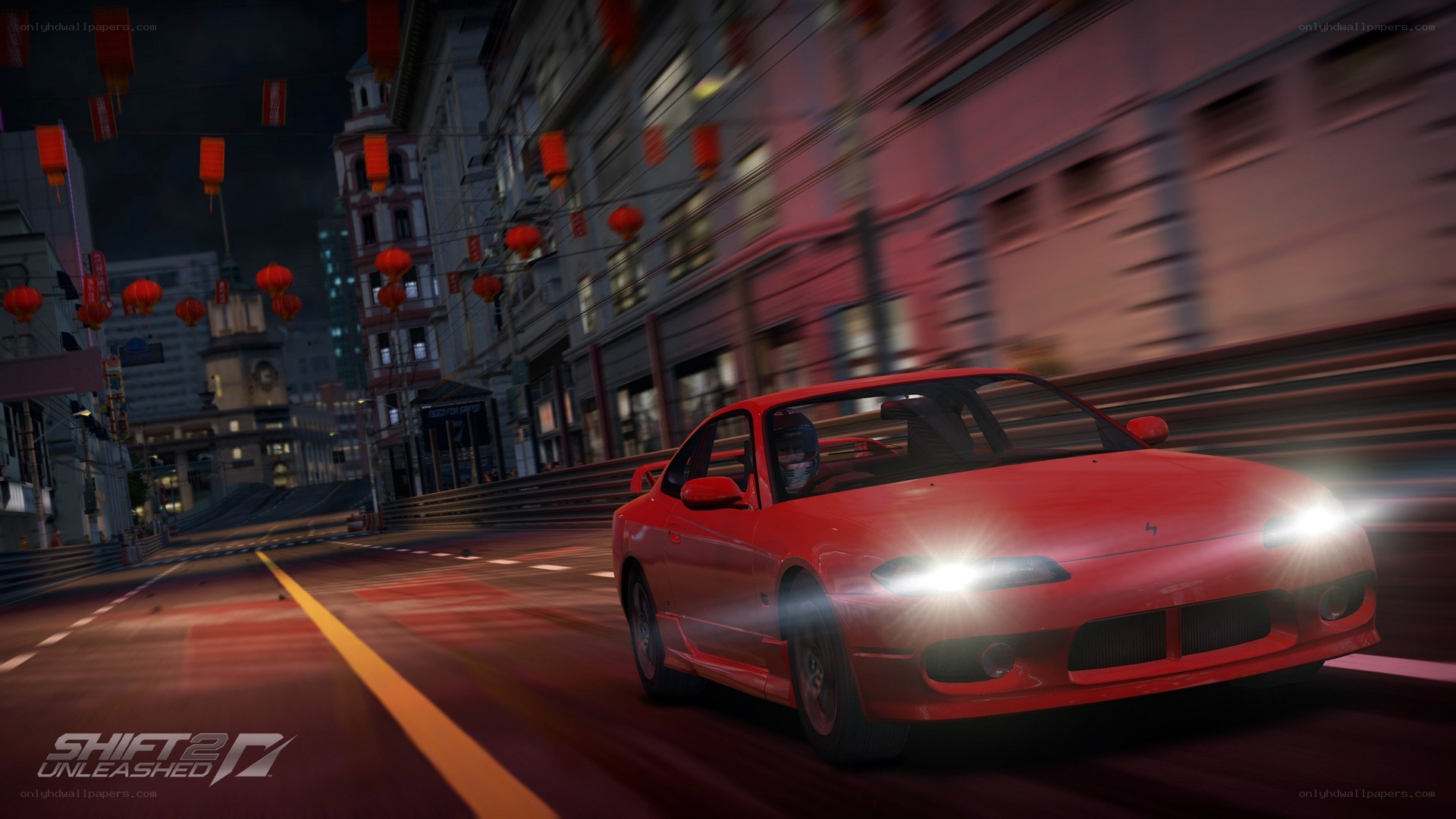 Red car racing at night