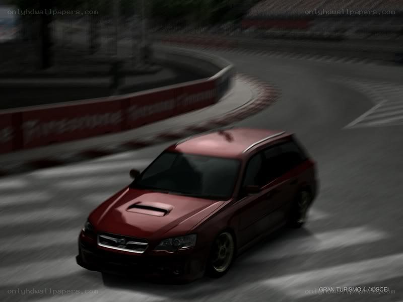 red car racing on track
