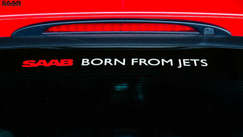 Red Car Rear Window — Dramatic