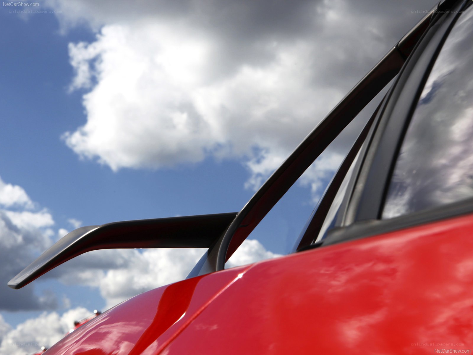 Red car side mirror detail
