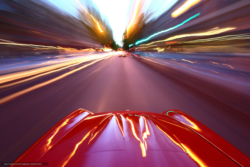 Red car speeding at night