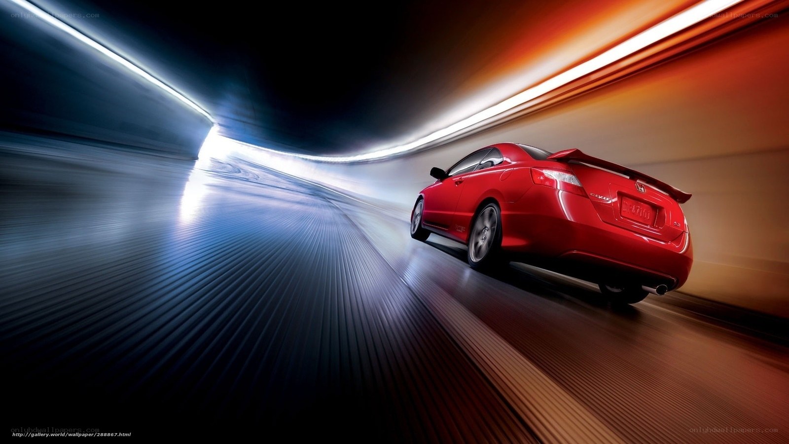 Red car speeding in tunnel