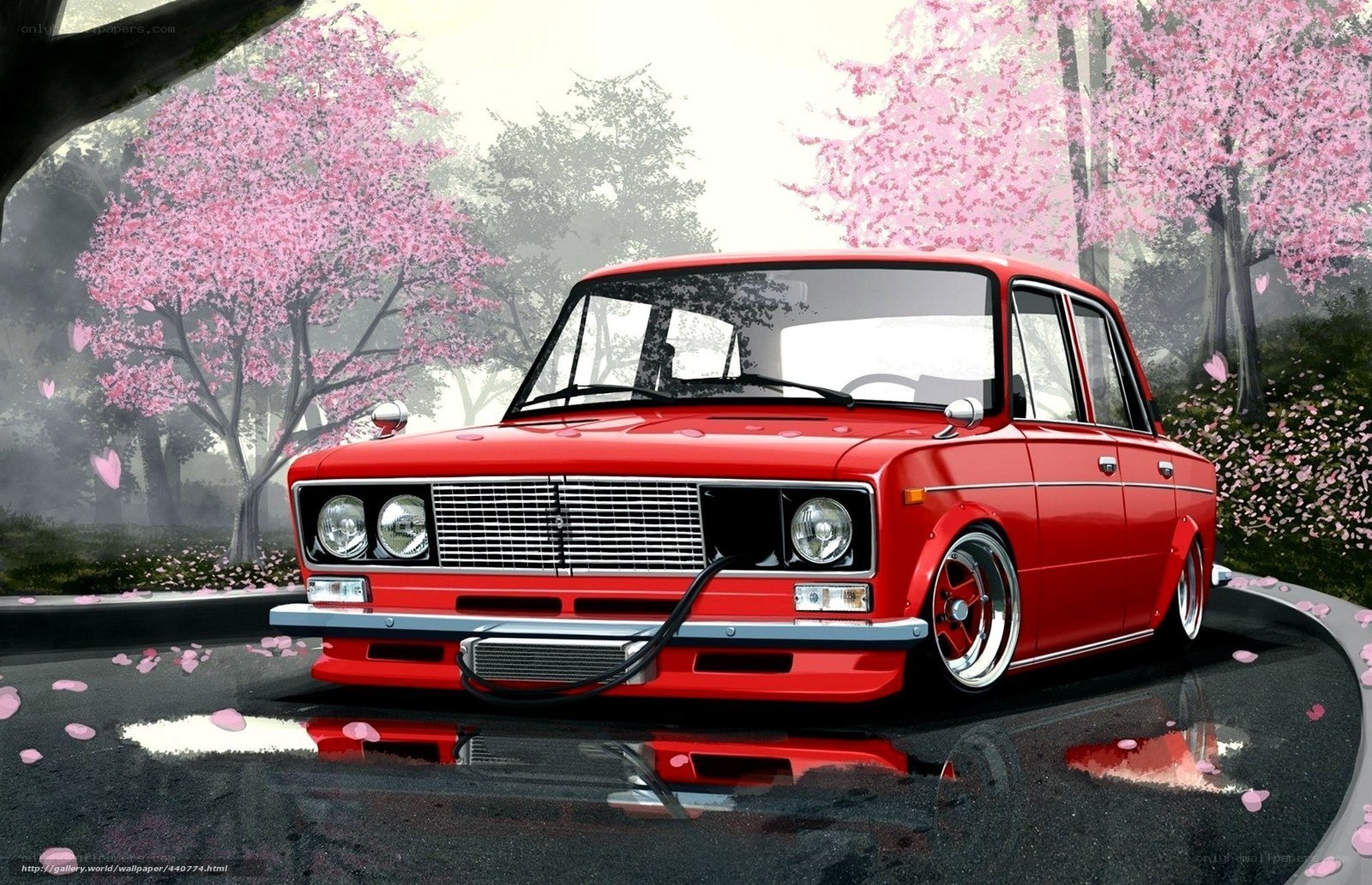 Red car under cherry blossoms
