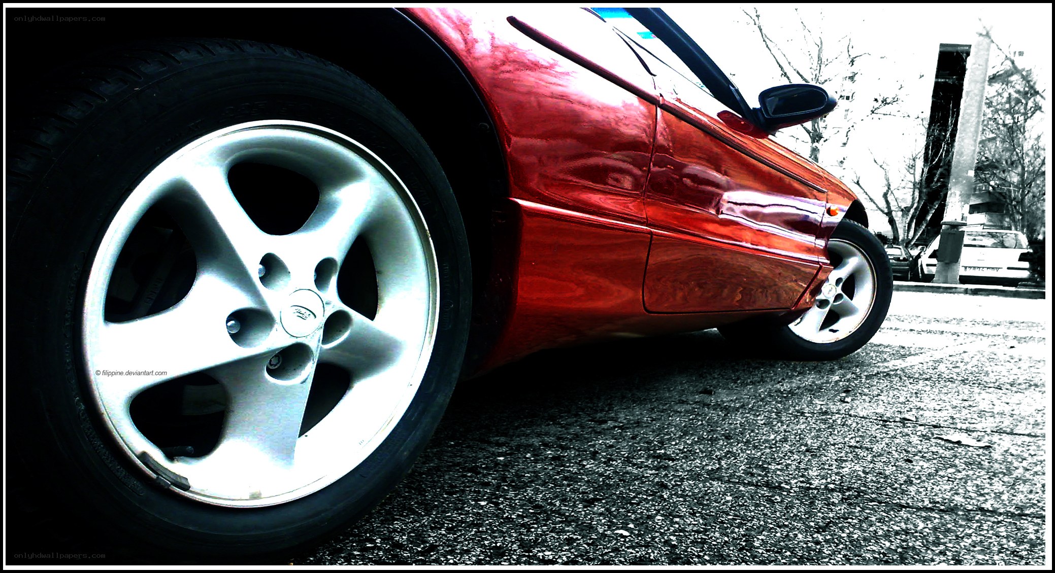 Red car wheel close-up