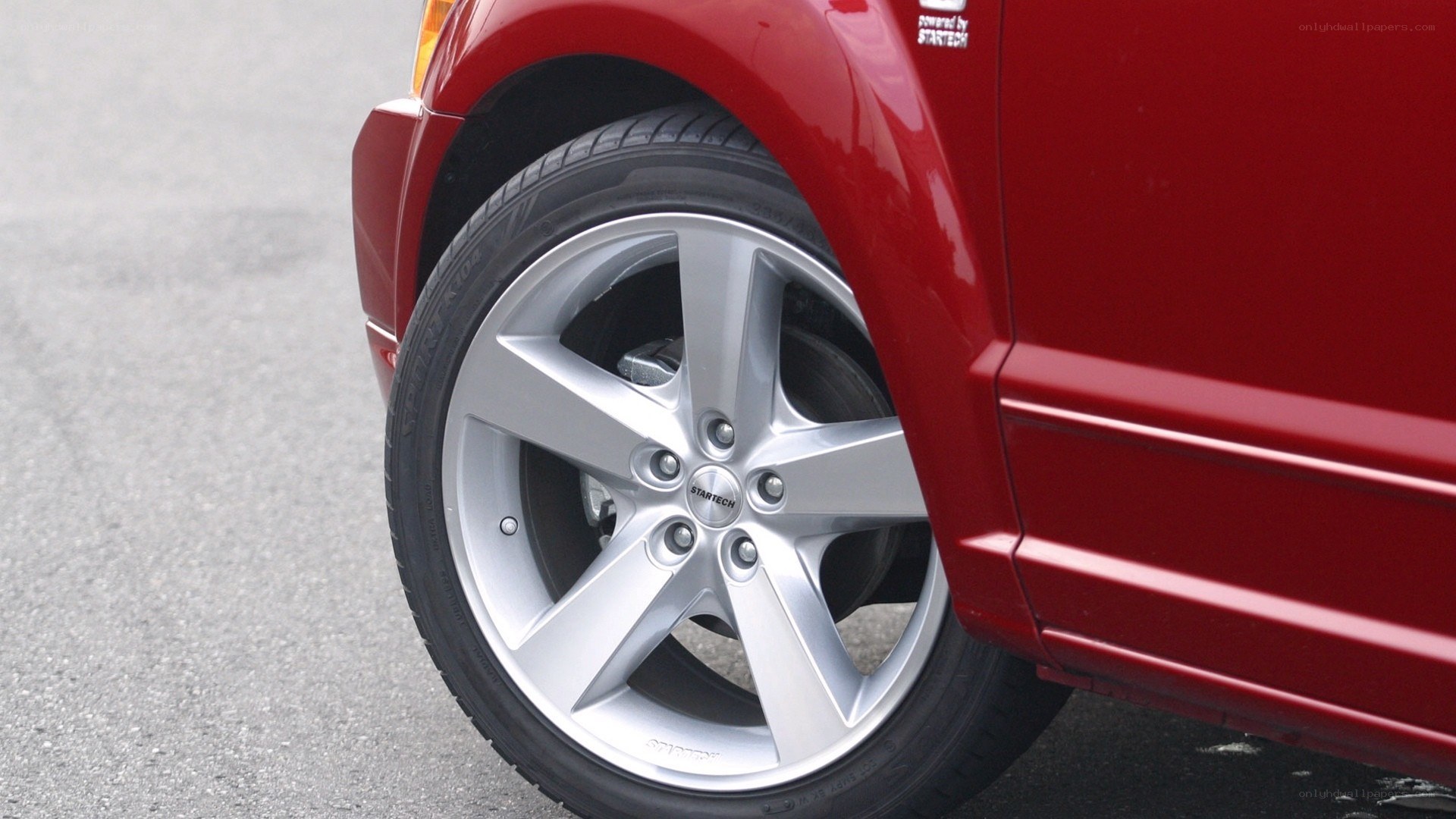 red car wheel close-up