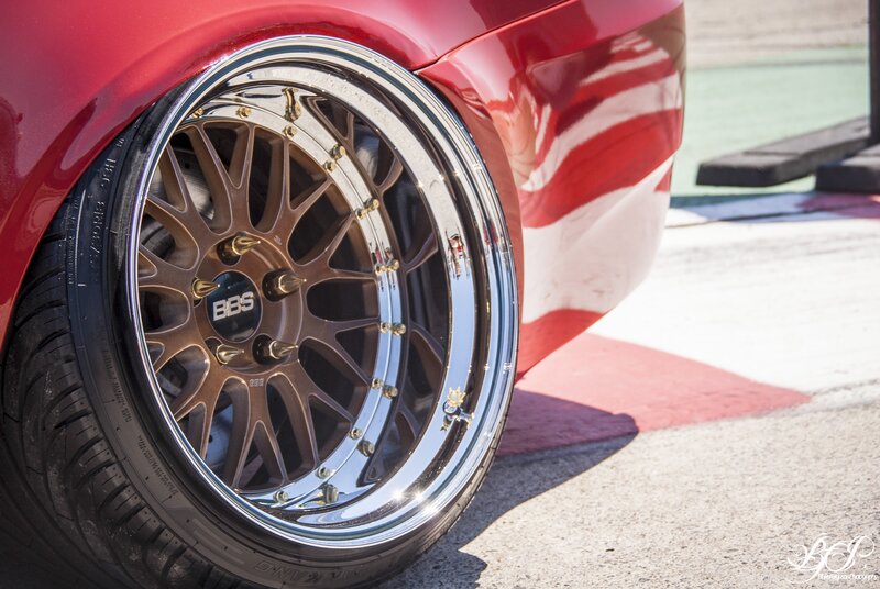 Red Car Wheel — Dramatic, Afternoon, Photograph