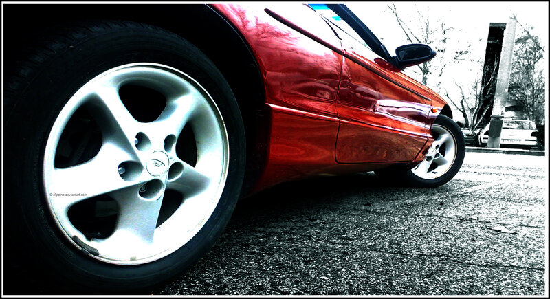Red Car Wheel — Dramatic, Photograph, Road