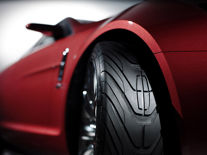 Red Car Wheel — Dramatic, Photograph, Tire
